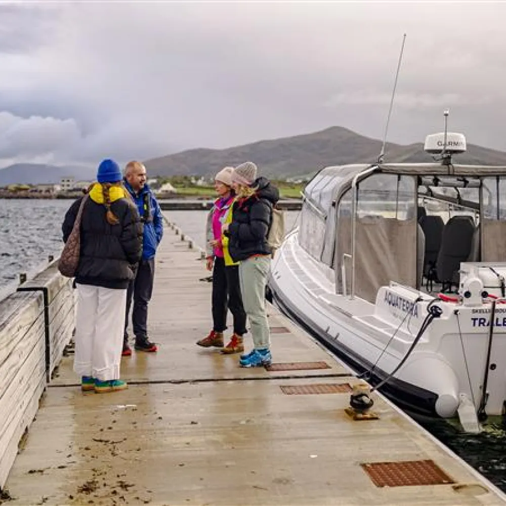 Visitors standing near AquaTerra Exclusive Skellig bounty
